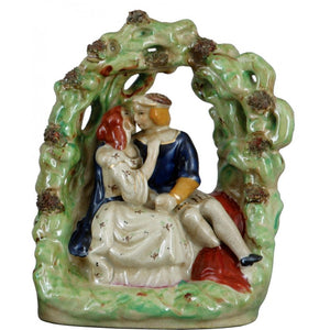 Staffordshire Reproduction Kissing Couple Figurine