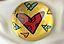 ROMERO BRITTO PAPERWEIGHT YELLOW WITH HEART DESIGN